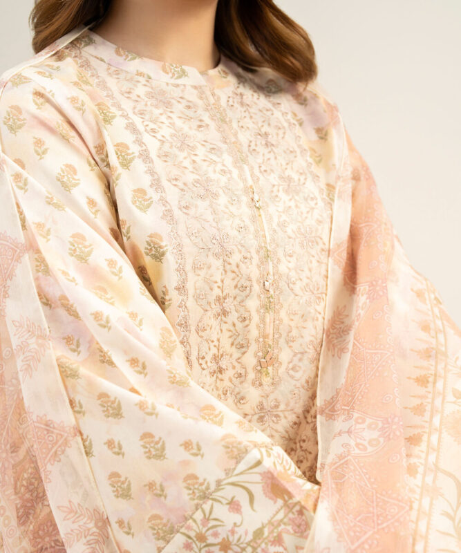 Embroidered Lawn 3 Piece in Off White and Corel Color Sukoon